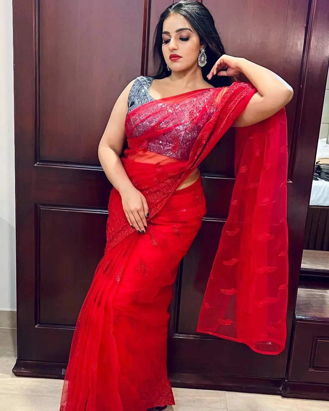 Malayalam Actress Malavika Menon In Red Saree Sleeveless Blue Blouse